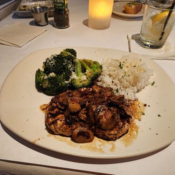Bonefish Grill - a plate of food with rice and broccoli - Seafood Near Me - Montgomery, Alabama
