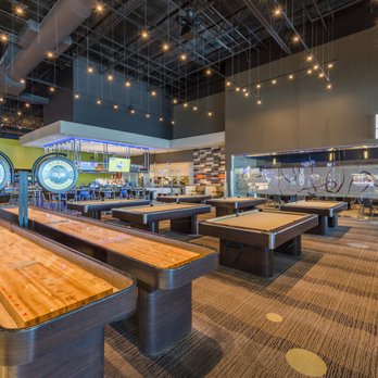Main Event Pharr - a row of shuffle tables in a sports bar - Arcades Near Me - Pharr, Texas Main Event Pharr - a row of shuffle tables in a sports bar - Arcades Near Me - Pharr, Texas