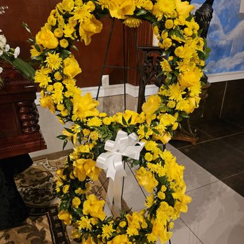 Exclusive Floral Creations - Double wreath all yellow. - Floral Designers Near Me - Houston, Texas Exclusive Floral Creations - Double wreath all yellow. - Floral Designers Near Me - Houston, Texas