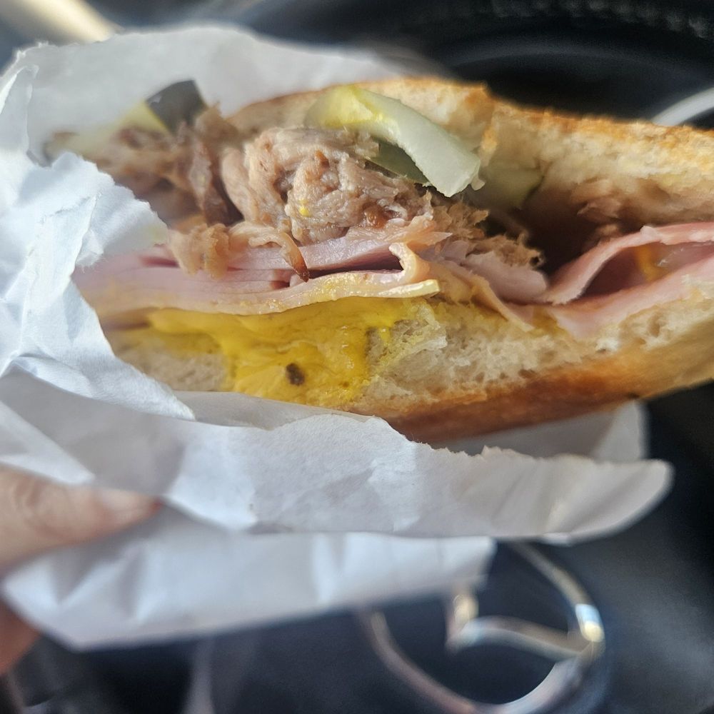 Cuban with some bites out of it. Very tasty! Cuban with some bites out of it. Very tasty!