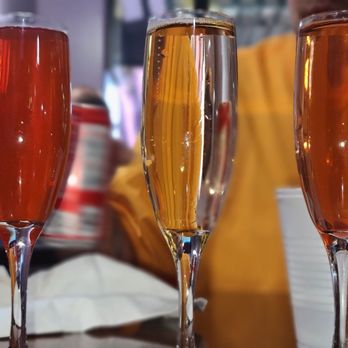 Crêpe Expectations - Mimosa Flight for $10! They have about 10 flavors for you to choose from. I chose cherry, peach, and I forgot. - Creperies Near Me - Las Vegas, Nevada