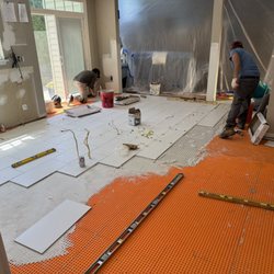 Floormax - And the floor goes in, on top of Ditra-Exel - the best, esp for wide joist floors, and the new floors going in.