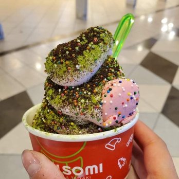 Somisomi - Cookie butter and Milk swirl with matcha powder, Oreo crumbs, and rainbow sprinkles, topped with a macaron - Desserts Near Me - Santa Clara, California