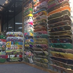 Aqua East Surf Shop - Skate decks for days!