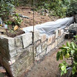 Salazar Masonry Services - The new retaining wall being built.