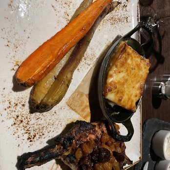 J Gilbert's - Roasted carrots, poblano au gratin potatoes, duroc pork chop - Bars Near Me - Omaha, Nebraska