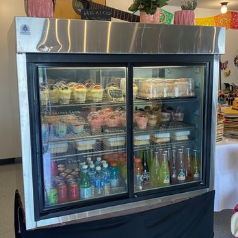 Cachua Cakes - a display case with a guitar on top - Bakeries Near Me - Iowa City, Iowa Cachua Cakes - a display case with a guitar on top - Bakeries Near Me - Iowa City, Iowa