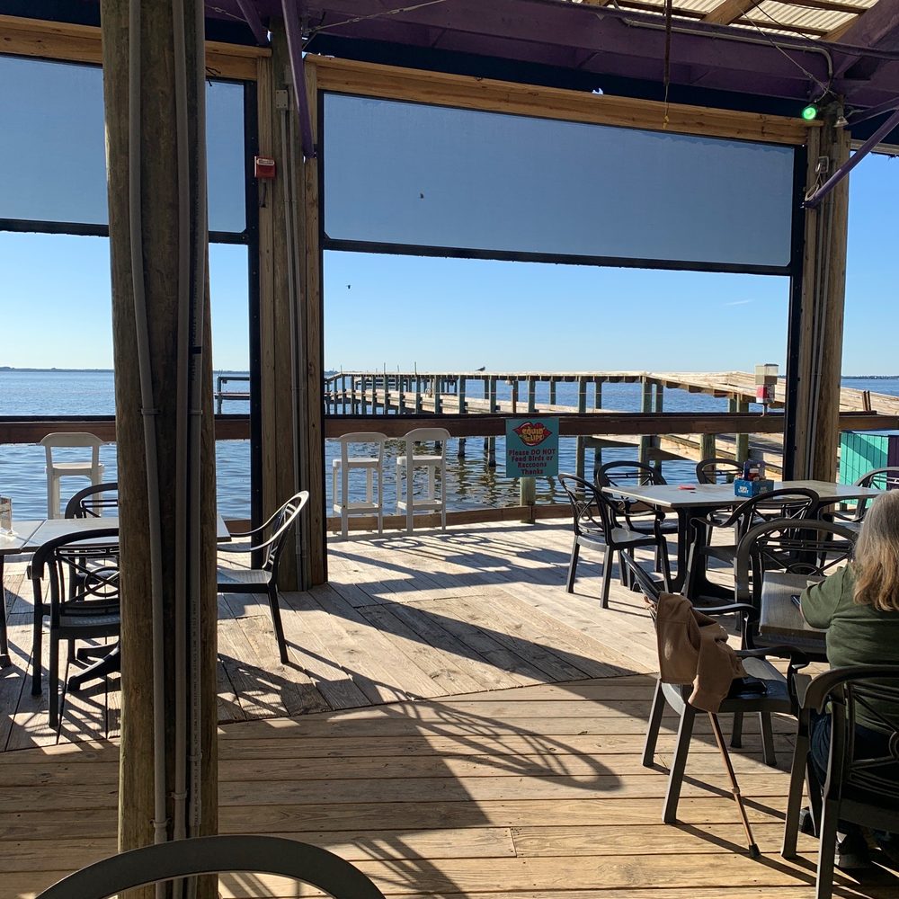 Squid Lips - Outside seating and bar are very nice - Seafood Near Me - Cocoa Beach, Florida Squid Lips - Outside seating and bar are very nice - Seafood Near Me - Cocoa Beach, Florida