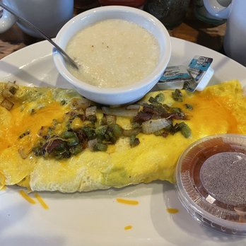 Old West Cafe - Delicious Outlaw Omelette with a cinnamon swirl pancake. - Breakfast & Brunch Near Me - Grapevine, Texas Old West Cafe - Delicious Outlaw Omelette with a cinnamon swirl pancake. - Breakfast & Brunch Near Me - Grapevine, Texas