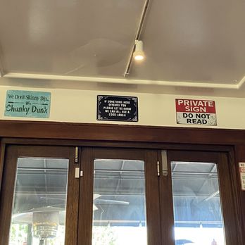 Petit Soleil - Just an example of some of the fun signs throughout. We spent our whole wait reading them all. - Breakfast & Brunch Near Me - Napa, California