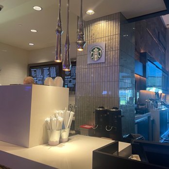 Starbucks - a starbucks coffee shop counter with people in the background - Coffee & Tea Near Me - Alpine, California Starbucks - a starbucks coffee shop counter with people in the background - Coffee & Tea Near Me - Alpine, California