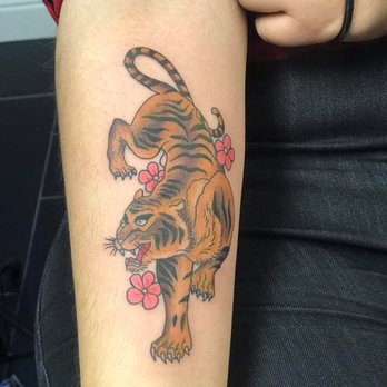Puzzle Piece Tattoo - My daughters old fashioned tiger done by Angel. - Tattoo Near Me - San Francisco, California Puzzle Piece Tattoo - My daughters old fashioned tiger done by Angel. - Tattoo Near Me - San Francisco, California