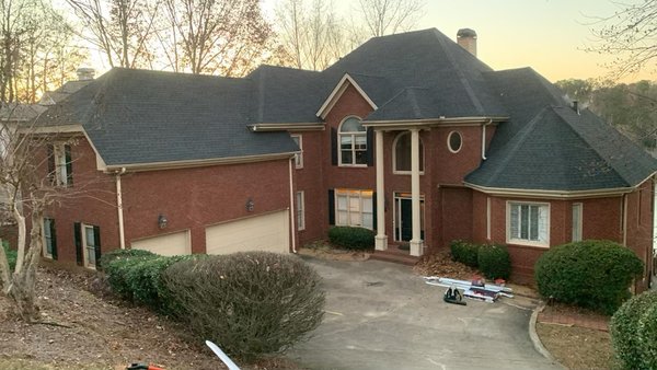 Mountain Roofing & Gutters Logo