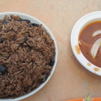 Piman Cafe Restaurant - Rice with black bean and gravy sauce - Haitian Near Me - Fort Lauderdale, Florida Piman Cafe Restaurant - Rice with black bean and gravy sauce - Haitian Near Me - Fort Lauderdale, Florida