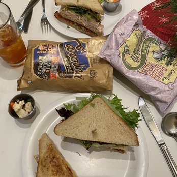 A Place At The Table - Turkey, bacon avocado club, turkey and Gouda panini, salt and vinegar chips, and rosemary and garlic chips. - Cafes Near Me - Raleigh, North Carolina A Place At The Table - Turkey, bacon avocado club, turkey and Gouda panini, salt and vinegar chips, and rosemary and garlic chips. - Cafes Near Me - Raleigh, North Carolina