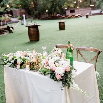 Flowers by Janet - Stunning sweetheart table floral decor (re-purposed from our ceremony arbor decor) - Florists Near Me - San Jose, California