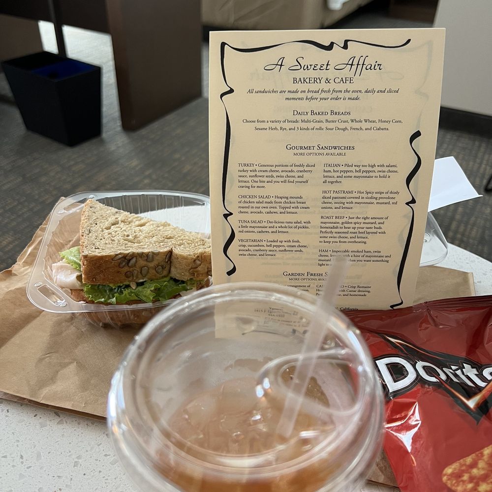 Half turkey on multi grain with fresh brewed iced tea Half turkey on multi grain with fresh brewed iced tea