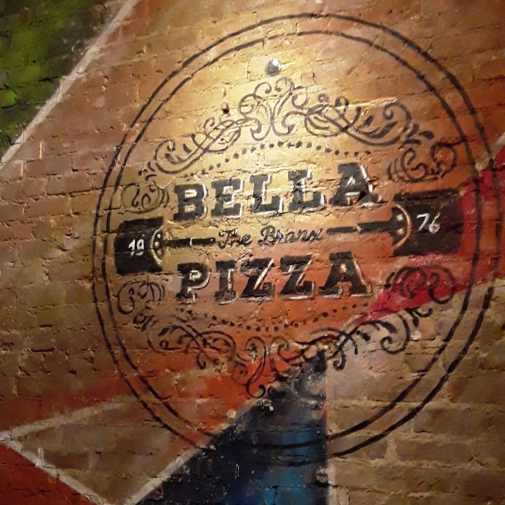 Bella Pizza - Logo on brick wall - Pizza Near Me - Bronx, New York Bella Pizza - Logo on brick wall - Pizza Near Me - Bronx, New York