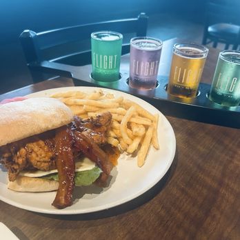 Flight Bar and Grill - Raspberry chipotle sandwich with Barn Town beer flight. - Breakfast & Brunch Near Me - Huxley, Iowa Flight Bar and Grill - Raspberry chipotle sandwich with Barn Town beer flight. - Breakfast & Brunch Near Me - Huxley, Iowa