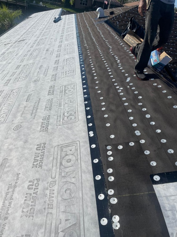 Slide of Escobar Roofing