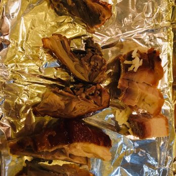 Wing Kee - AWFUL! Meat from my combo rice plate that i reheated. This was all there was. Just bones really. Scrap pieces! - Cantonese Near Me - Houston, Texas