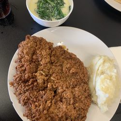 Cindy Sue Cafe & Catering - Chicken fried steak, creamed spinach and mashed potatoes.