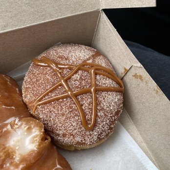 Friendly Donuts - My boyfriend got their Dulce de Leche Donut that is filled with dulce de leche! He said it was a 10/10! (Not vegan) - Donuts Near Me - Orange, California