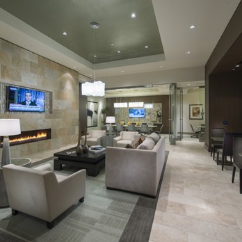 Hanover Post Oak - Lobby lounge area with fireplace, two conference rooms and seating nooks. - Apartments Near Me - Houston, Texas Hanover Post Oak - Lobby lounge area with fireplace, two conference rooms and seating nooks. - Apartments Near Me - Houston, Texas