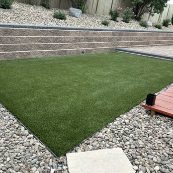 Outdoor Legacy - Artificial turf, new patio and retaining wall - Landscaping Near Me Outdoor Legacy - Artificial turf, new patio and retaining wall - Landscaping Near Me