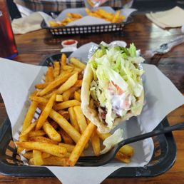 Large gyro with fries. Large gyro with fries.