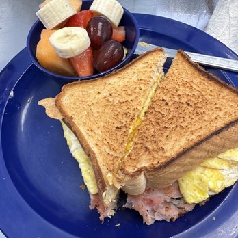 Wooden Spoon - Breakfast sandwich on Texas toast with side cup of fruit - American Near Me - Marathon, Florida Wooden Spoon - Breakfast sandwich on Texas toast with side cup of fruit - American Near Me - Marathon, Florida