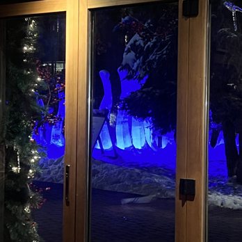 Lancelot Restaurant - Ice statues view from window seating - Steakhouses Near Me - Vail, Colorado