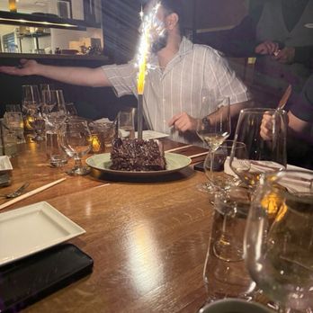 Stetsons Modern Steak + Sushi - Somebody at our table had a birthday. This cake was delicious. - Sushi Bars Near Me - Chicago, Illinois