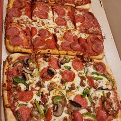 Pizza Hut - Supreme, pepperoni, and chicken with bacon pizzas.