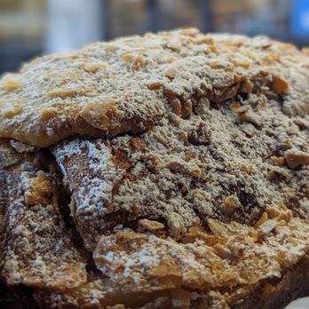 Julien Boulangerie - a hand holding a pastry - Bakeries Near Me - New York, New York Julien Boulangerie - a hand holding a pastry - Bakeries Near Me - New York, New York