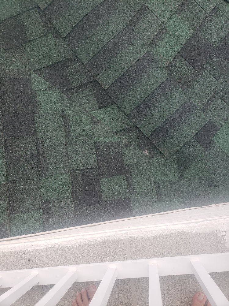 Slide of Bay to Bay Roofing