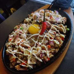 Pookaberry Cafe New York - Sizzling sisig with the real pig parts as the authentic recipe calls for