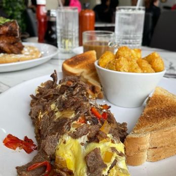 Blossoms Brunch Bar - Philly cheese steak omelette - Breakfast & Brunch Near Me - Rahway, New Jersey Blossoms Brunch Bar - Philly cheese steak omelette - Breakfast & Brunch Near Me - Rahway, New Jersey
