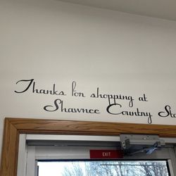 Shawnee Country Store - Sign above door.