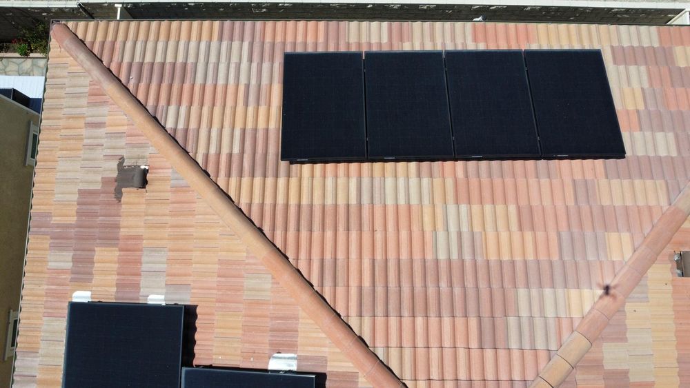 Slide of All American Construction and Roofing