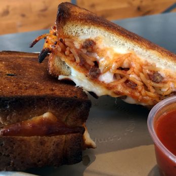 Burnt Crumbs - Spaghetti Grilled Cheese is one of the most popular items on the menu. - New American Near Me - Irvine, California Burnt Crumbs - Spaghetti Grilled Cheese is one of the most popular items on the menu. - New American Near Me - Irvine, California