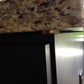 Doctor Closet - wooden wedge under counter, found in several area - Kitchen & Bath Near Me - Medley, Florida