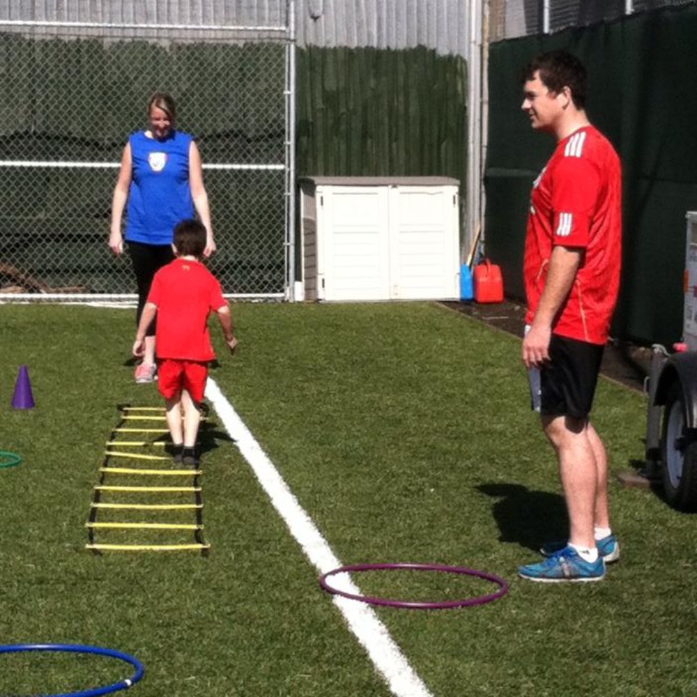 SFF Soccer Cubs - The Coaches showing the kids the drills - Soccer Near Me - San Francisco, California SFF Soccer Cubs - The Coaches showing the kids the drills - Soccer Near Me - San Francisco, California