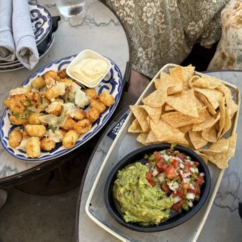 The Nolen - Chips and guacamole and truffle tots. Get the tots for sure! - Cocktail Bars Near Me - San Diego, California The Nolen - Chips and guacamole and truffle tots. Get the tots for sure! - Cocktail Bars Near Me - San Diego, California