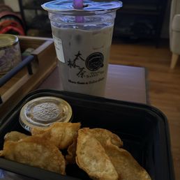 Takeout: Pork dumplings; large Taro Milk Tea