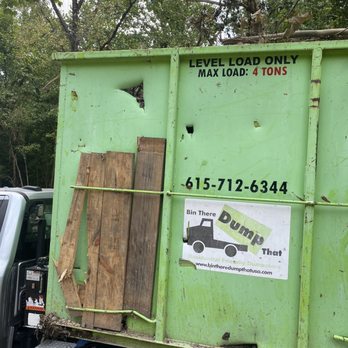 Maverick Excavation - a dump truck with a green dumpster in the back - Excavation Services Near Me Maverick Excavation - a dump truck with a green dumpster in the back - Excavation Services Near Me