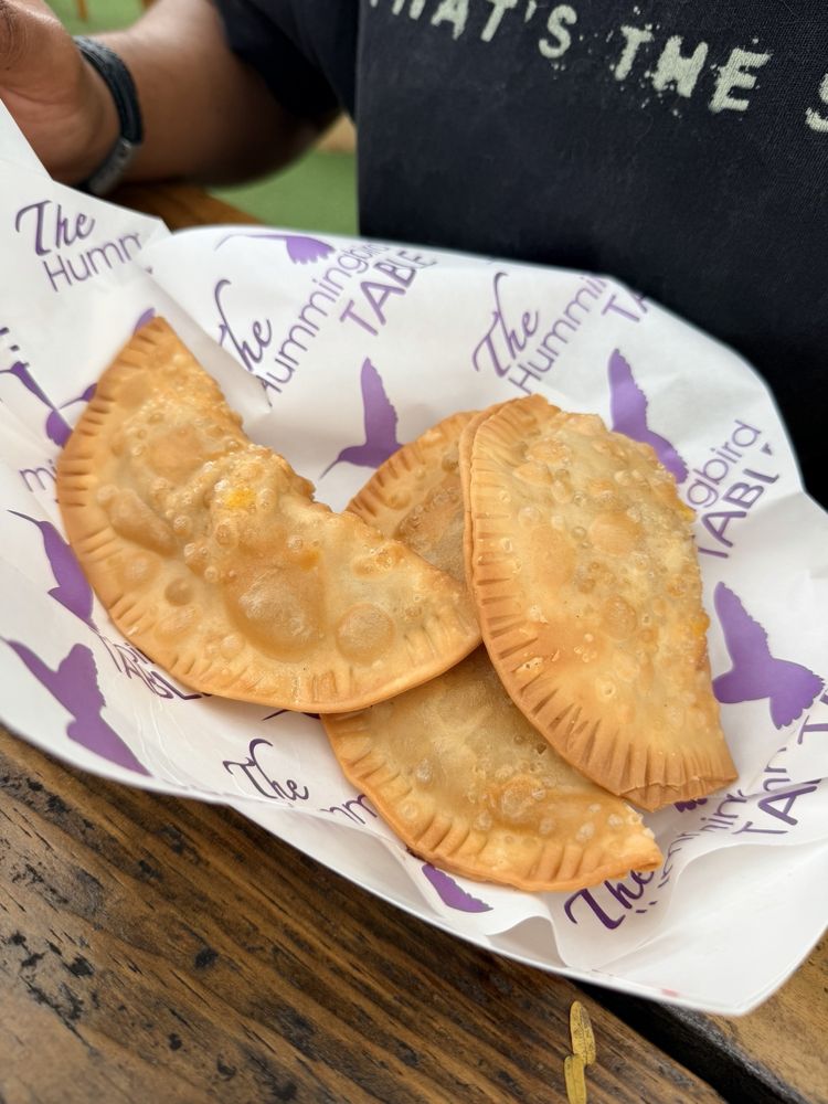 The Hummingbird Table Logo