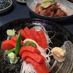 Wild sockeye salmon sashimi $16 (front) and spicy tuna sashimi $16 (back). Half sizes available for both dishes. Wild sockeye salmon sashimi $16 (front) and spicy tuna sashimi $16 (back). Half sizes available for both dishes.