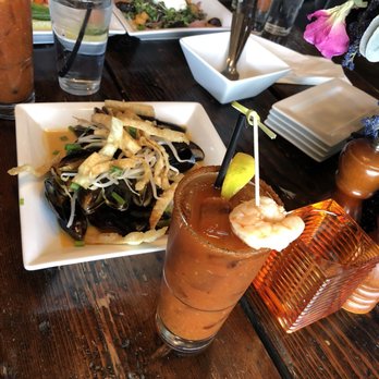 Rik's Cafe - A bowl of orange Thai mussels and a Bloody Mary - Cafes Near Me - Hagerstown, Maryland Rik's Cafe - A bowl of orange Thai mussels and a Bloody Mary - Cafes Near Me - Hagerstown, Maryland