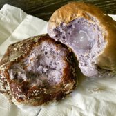 Photo of Kamehameha Bakery - Honolulu, HI, United States. Left: Poi Glazed Donut $1.05 Right: Poi Haupia Roll $1.15